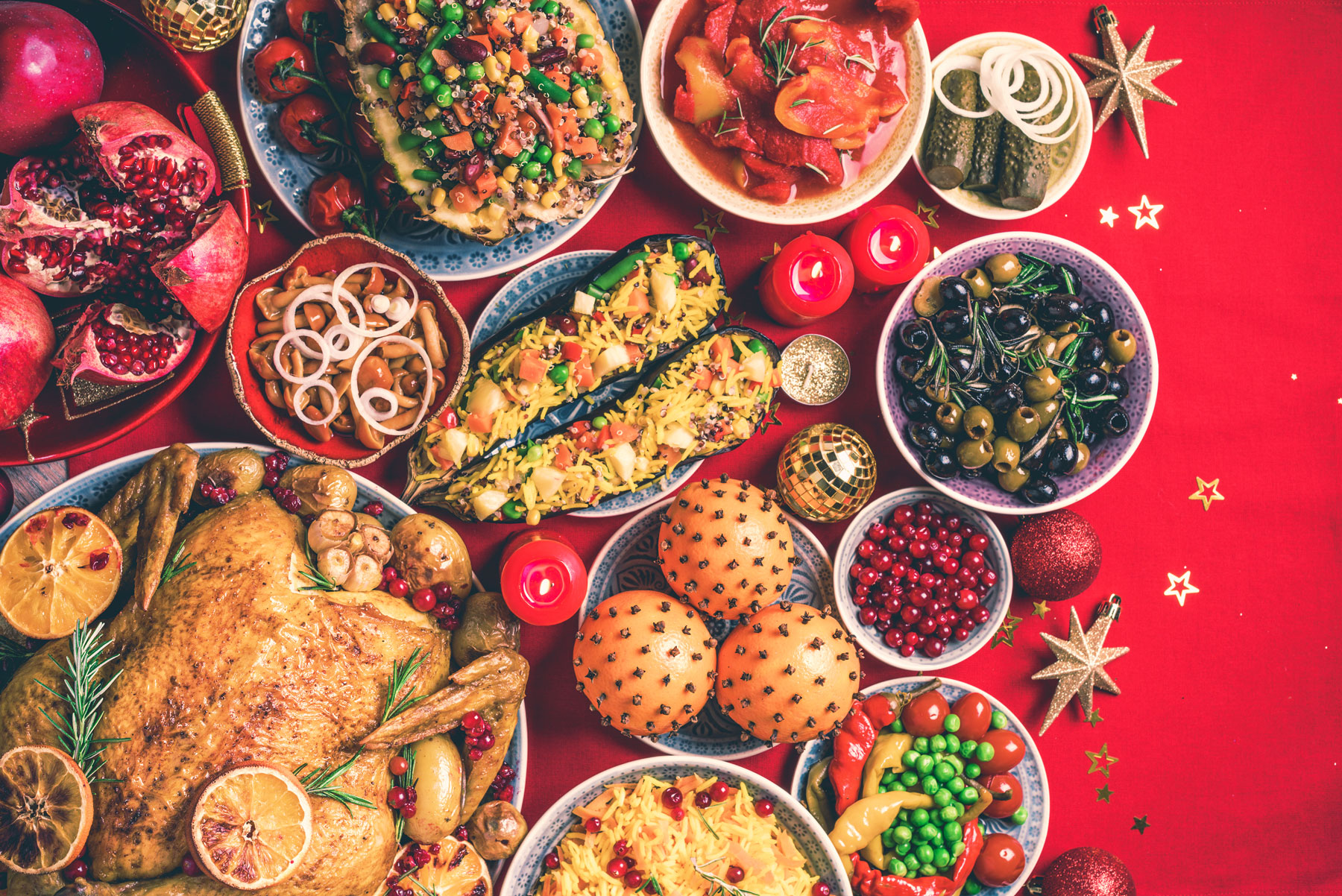 a red table full of delicious holiday food